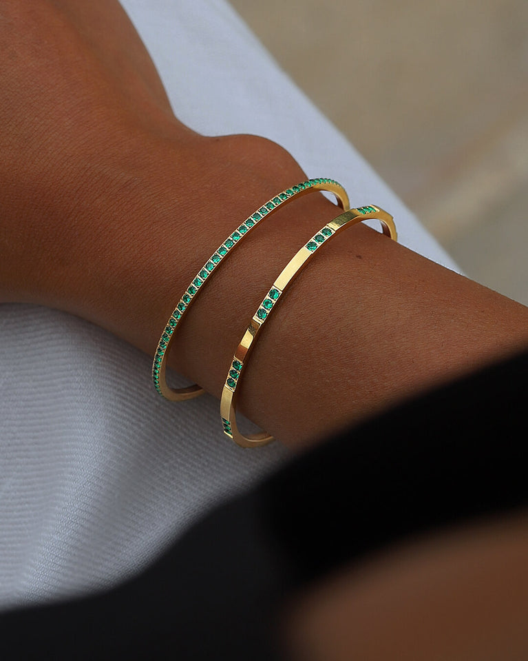 A Bangle in Rhodium-plated 316L stainless steel from Waldor & Co. One size. The model is Dulcet Bangle Polished.