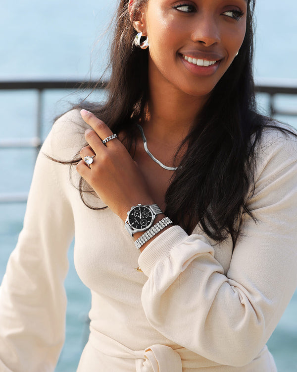 A polished stainless steel chain in silver from Waldor & Co. One size. The model is Tennis Trio Chain Polished