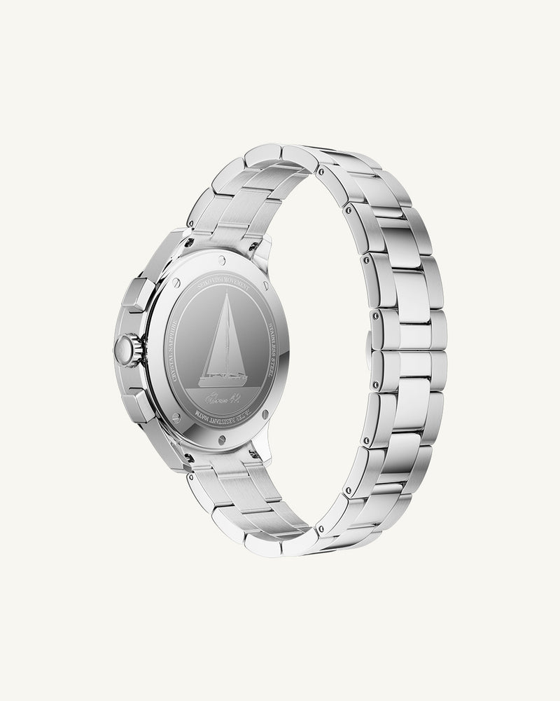 A round mens watch in rhodium-plated silver from Waldor & Co. with black sunray dial and a second hand. Seiko movement. The model is Chrono 42 Capri 42mm.