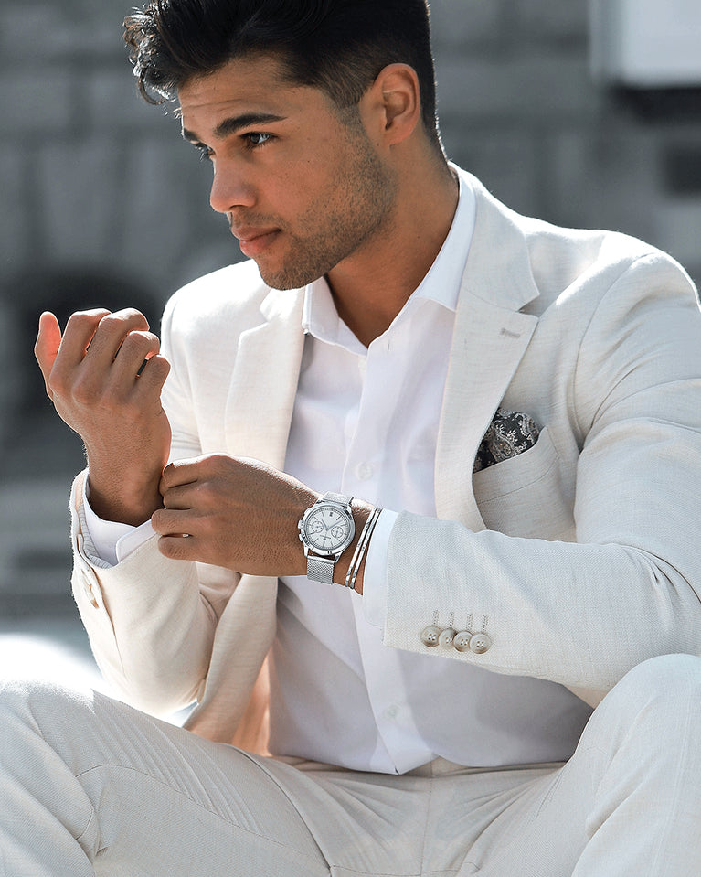  A round mens watch in rhodium-plated silver from Waldor & Co. with white sunray dial and a second hand. Seiko movement. The model is Chrono 39 Sardinia 39mm.